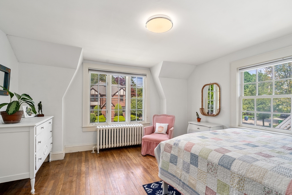 17 Charlotte Road Newton, MA 02459 - Photo 17 of 34 a bedroom with a bed and a window with outer view