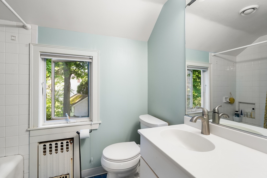 17 Charlotte Road Newton, MA 02459 - Photo 21 of 34 a bathroom with a sink a toilet and a window