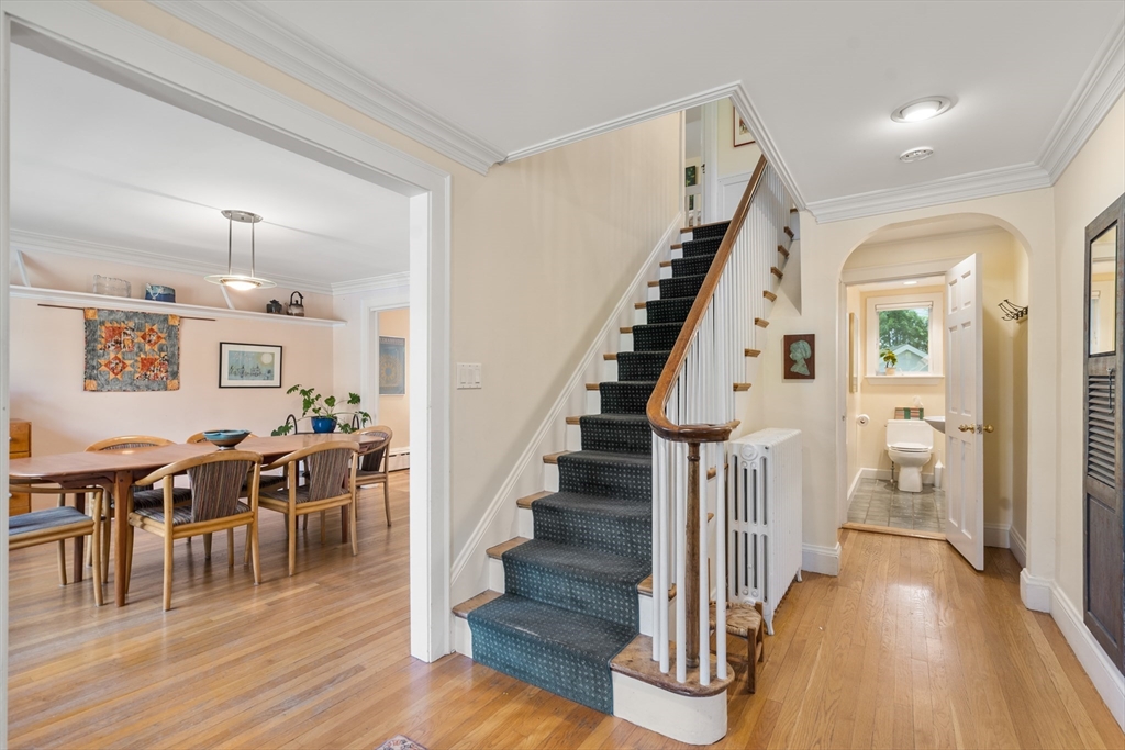 17 Charlotte Road Newton, MA 02459 - Photo 3 of 34 a view of a dining room with wooden floor windows and entryway