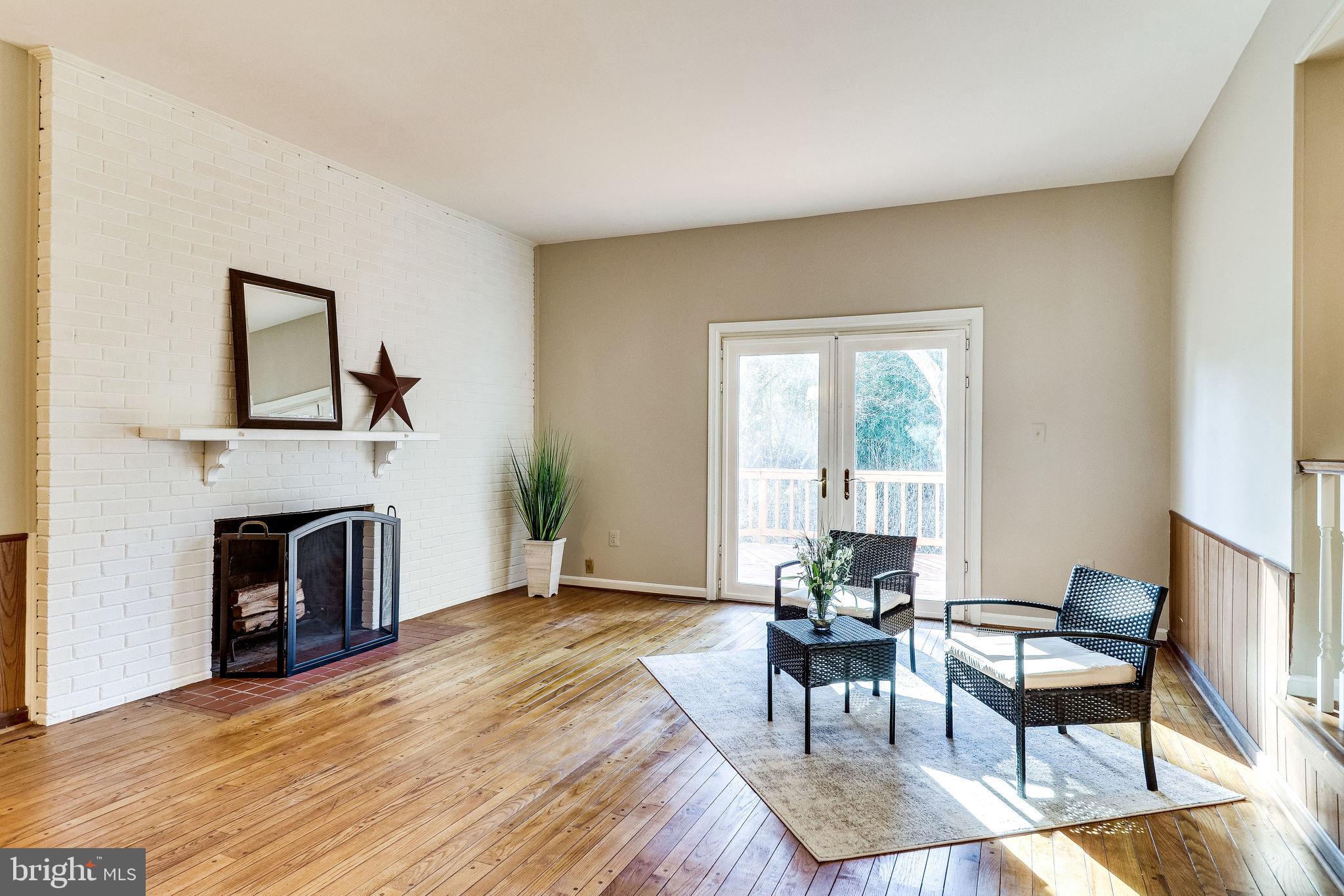 7818 Cliffside Court Springfield, VA 22153 - Photo 20 of 53 Family room with glass door to private deck
