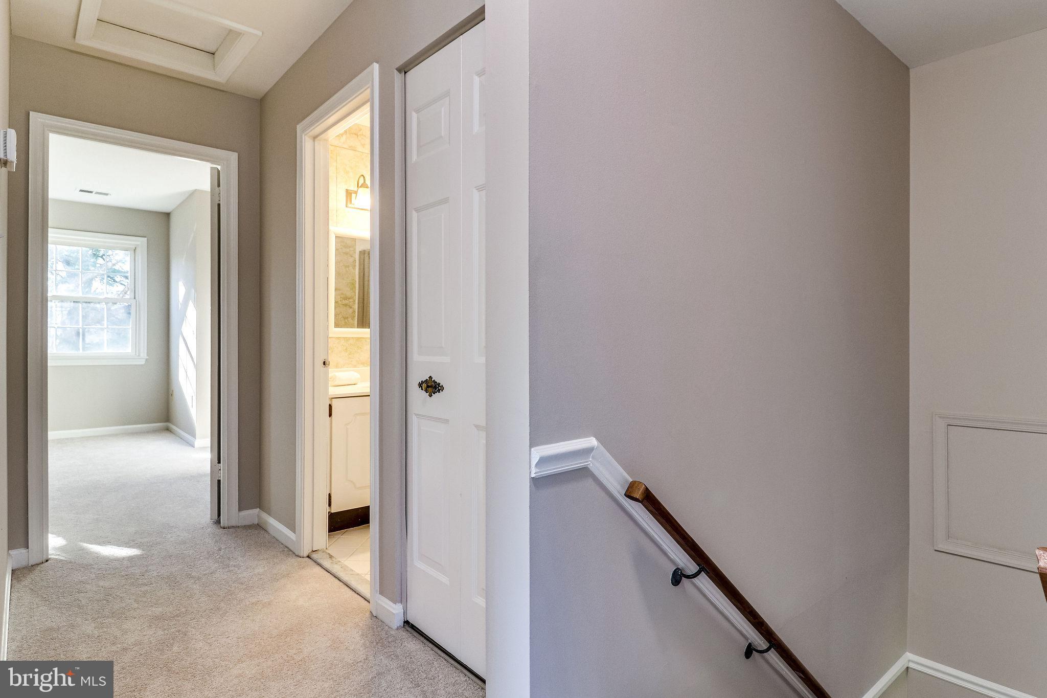 7818 Cliffside Court Springfield, VA 22153 - Photo 38 of 53 upper level landing with linen closet