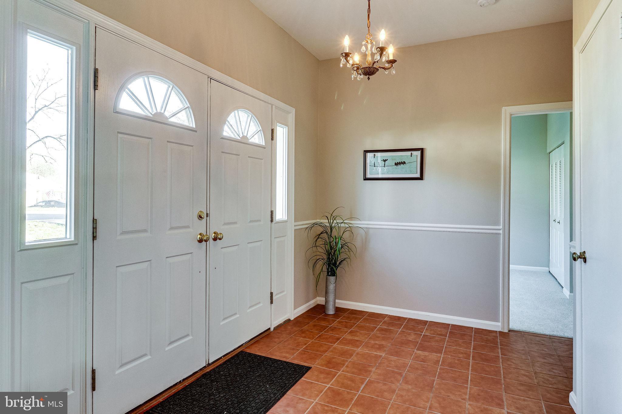 7818 Cliffside Court Springfield, VA 22153 - Photo 5 of 53 Large foyer with tile flooring