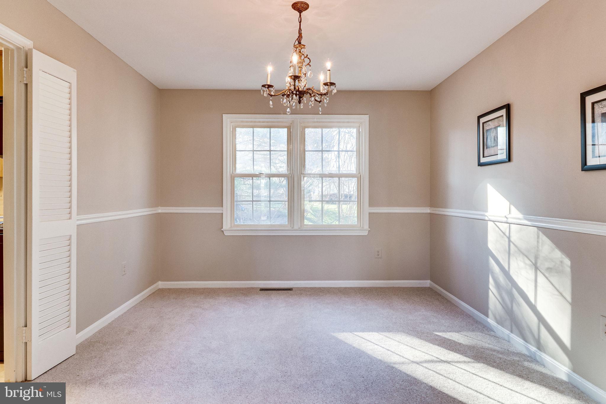 7818 Cliffside Court Springfield, VA 22153 - Photo 10 of 53 Separate dining room with new carpet