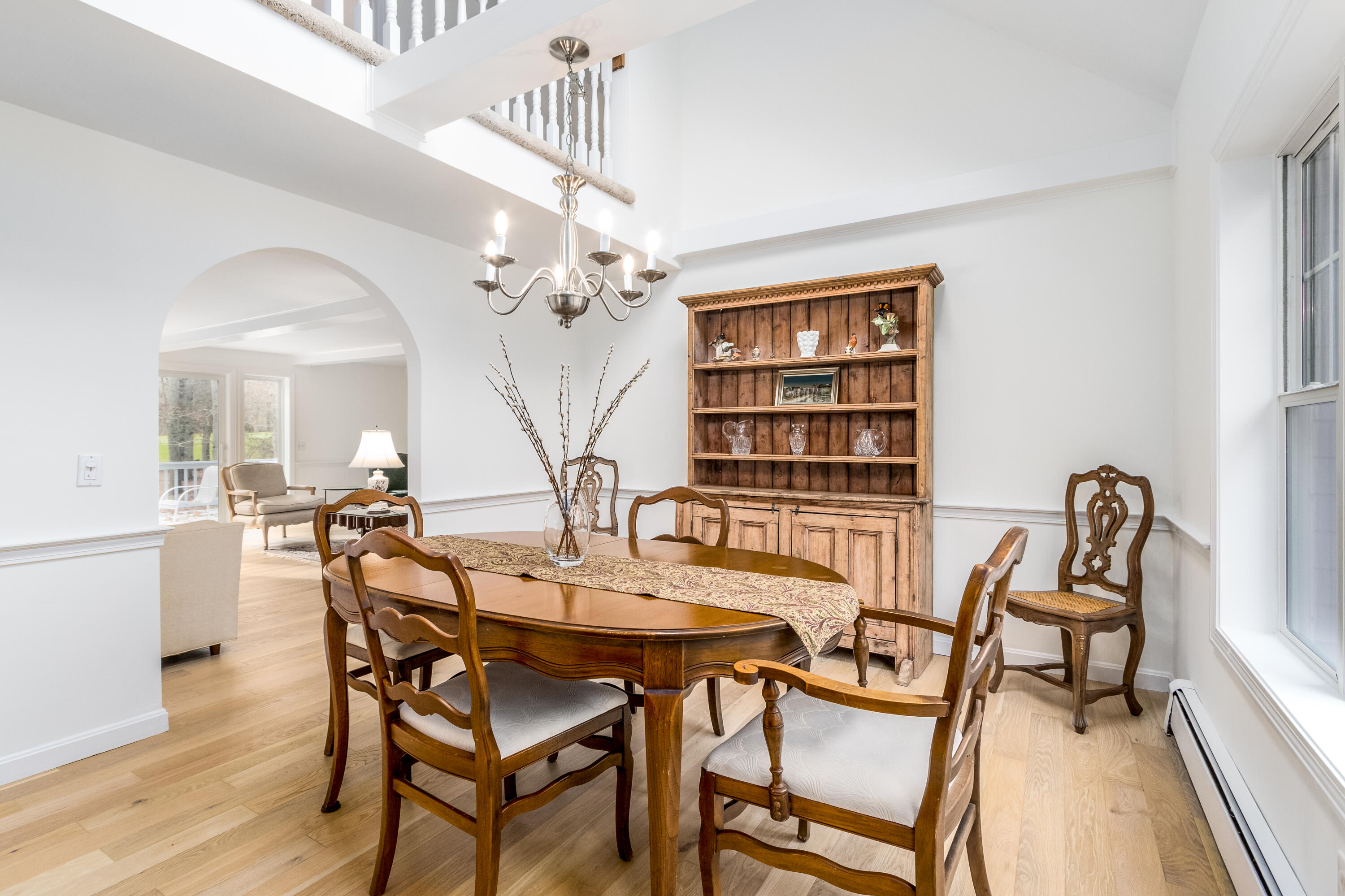 189 Dromoland Lane Barnstable, MA 02630 - Photo 15 of 40 a view of a dining room with furniture and wooden floor