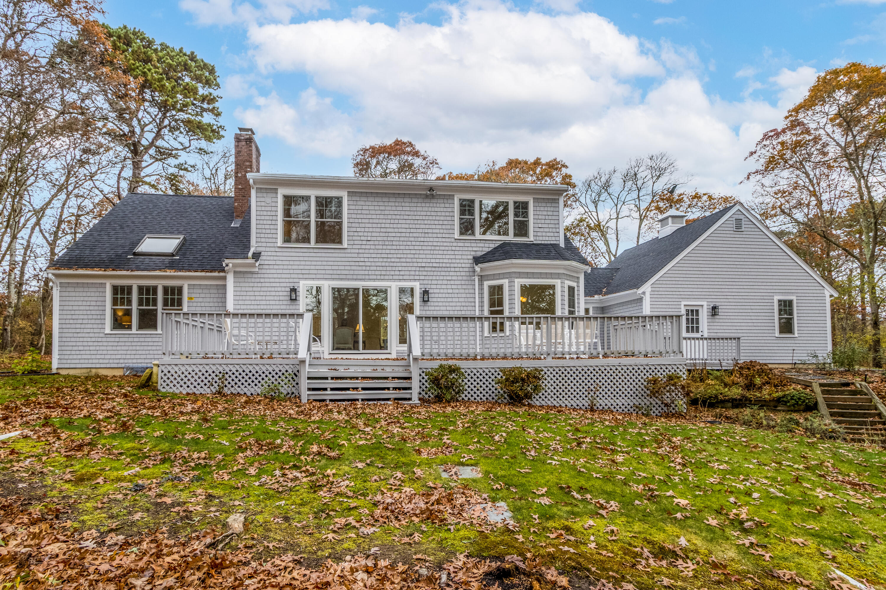 189 Dromoland Lane Barnstable, MA 02630 - Photo 35 of 40 a front view of a house with a yard
