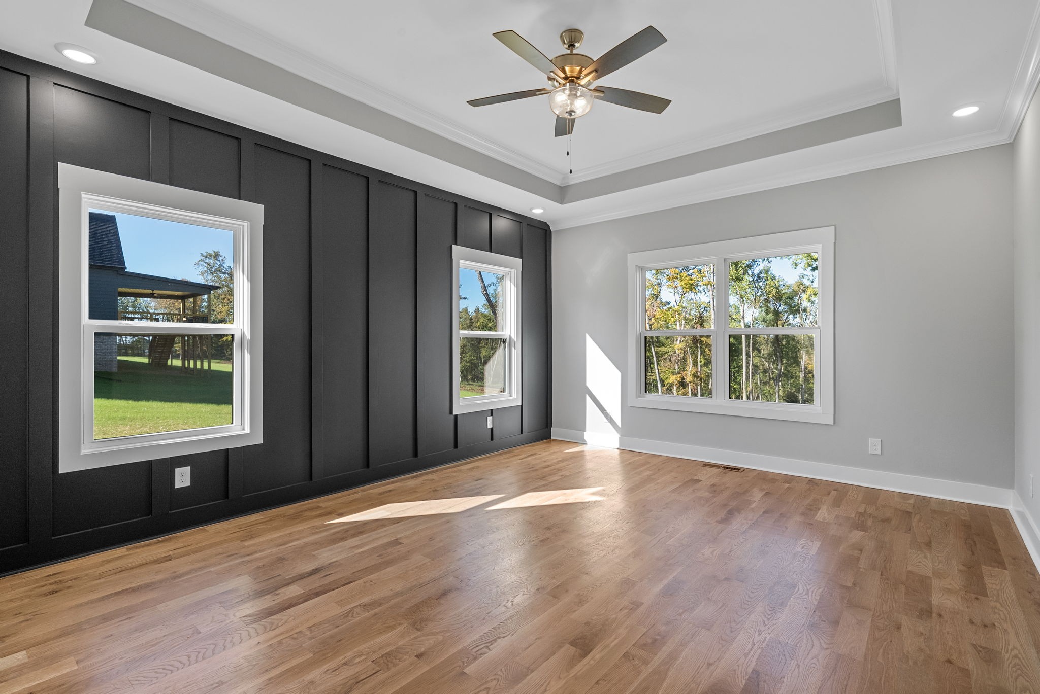 1808 Gholson Road Clarksville, TN 37043 - Photo 28 of 36 a view of an empty room with a window and wooden floor