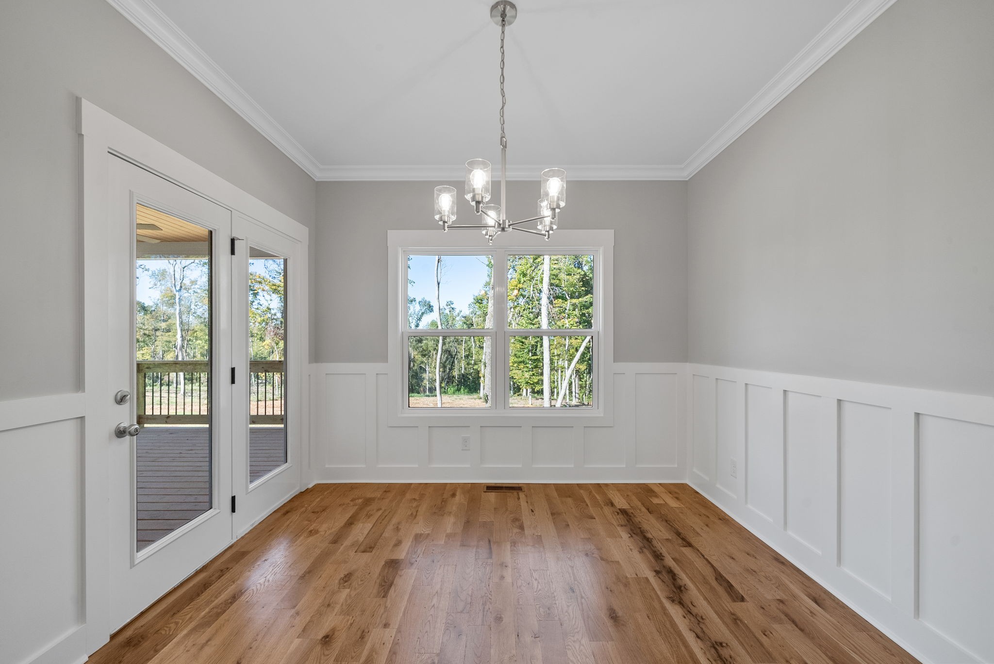 1808 Gholson Road Clarksville, TN 37043 - Photo 32 of 36 a view of an empty room with wooden floor and a window