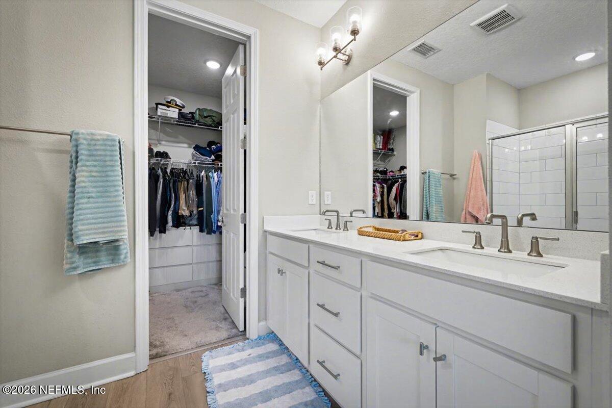 75315 Plumbago Yulee, FL 32097 - Photo 16 of 37 a bathroom with a sink double vanity