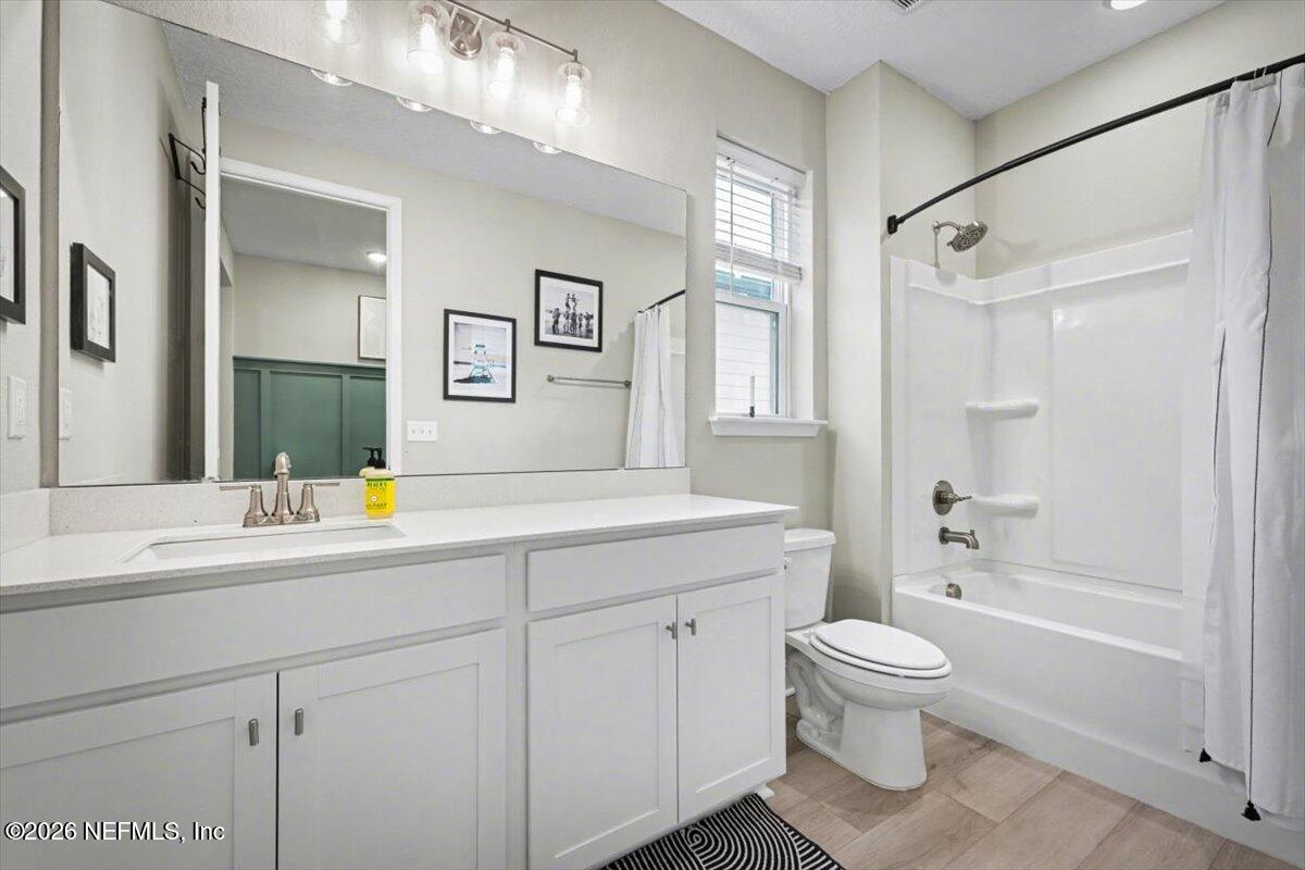 75315 Plumbago Yulee, FL 32097 - Photo 20 of 37 a bathroom with a sink toilet and shower