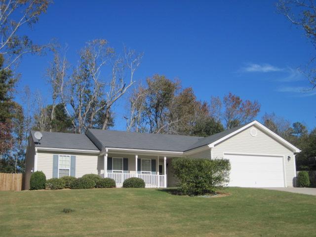 400 Warpath Road, Unit 39 Statham, GA 30666 - Photo 1 of 1 a front view of a house with a yard