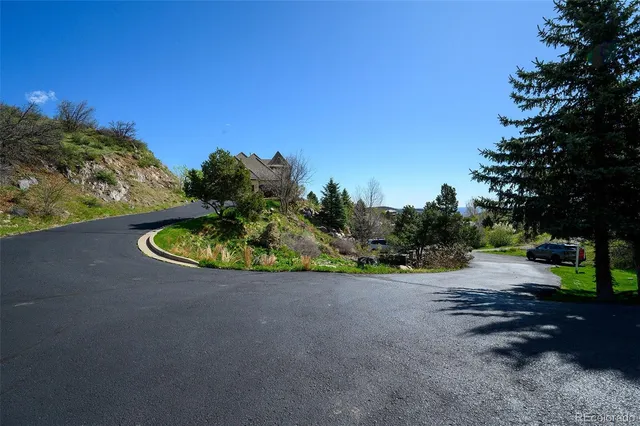 a view of a road with a yard