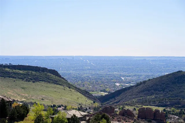 a view of a yard with an ocean