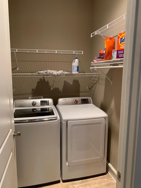 3407 Bryan Street, Unit E Dallas, TX 75204 - Photo 12 of 12 a utility room with dryer and washer