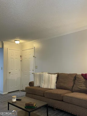 a workspace with furniture and wooden floor