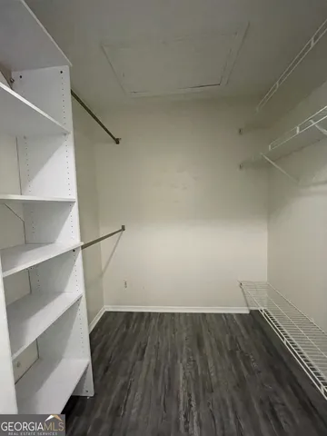 a view of an empty walk in closet