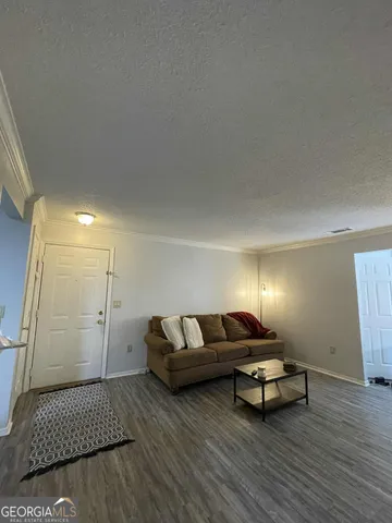 a living room with furniture and a couch