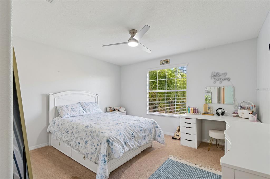3620 Lefays Point Land O Lakes, FL 34638 - Photo 24 of 50 a bedroom with a bed and a window