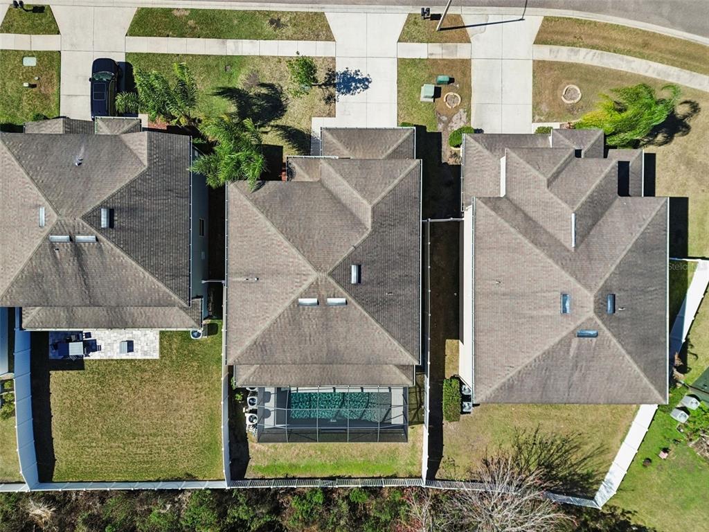 3620 Lefays Point Land O Lakes, FL 34638 - Photo 39 of 50 an aerial view of a house with a yard