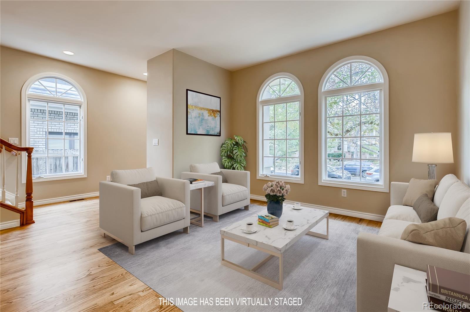 210 Cook Street Denver, CO 80206 - Photo 14 of 34 a living room with furniture and a large window