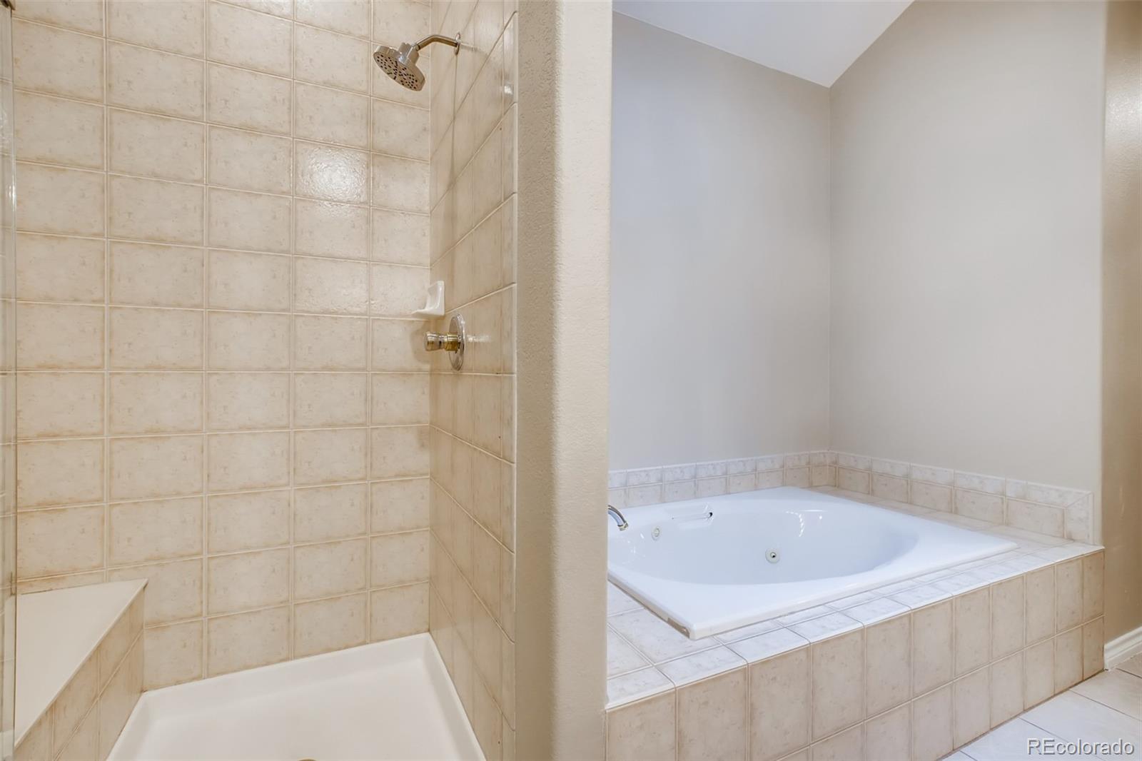 210 Cook Street Denver, CO 80206 - Photo 20 of 34 a bathroom with a bathtub