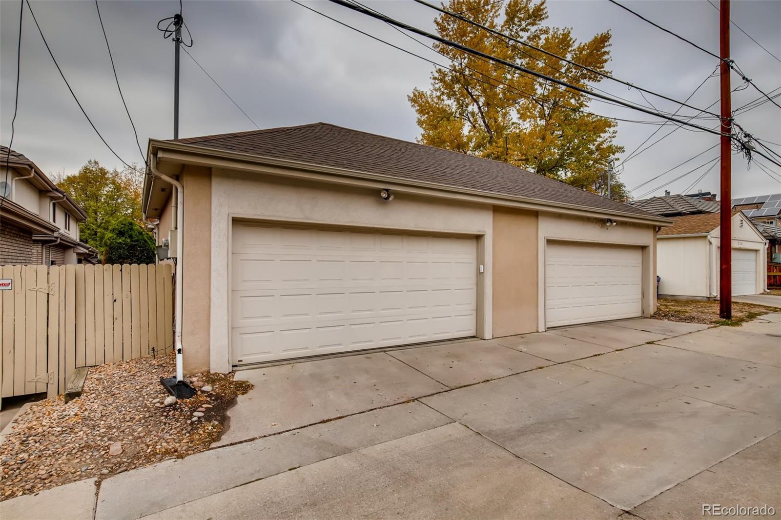 210 Cook Street Denver, CO 80206 - Photo 27 of 34 a small white house with a outdoor space