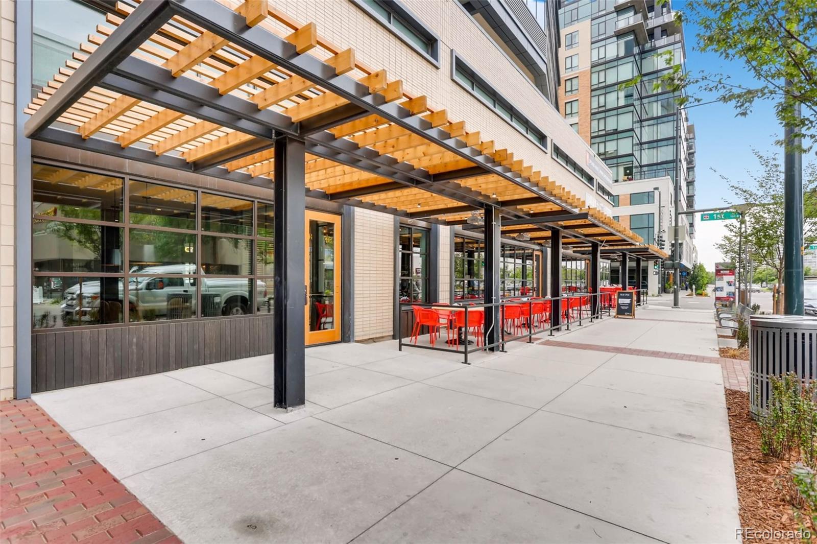 210 Cook Street Denver, CO 80206 - Photo 28 of 34 a view of a building with sitting area