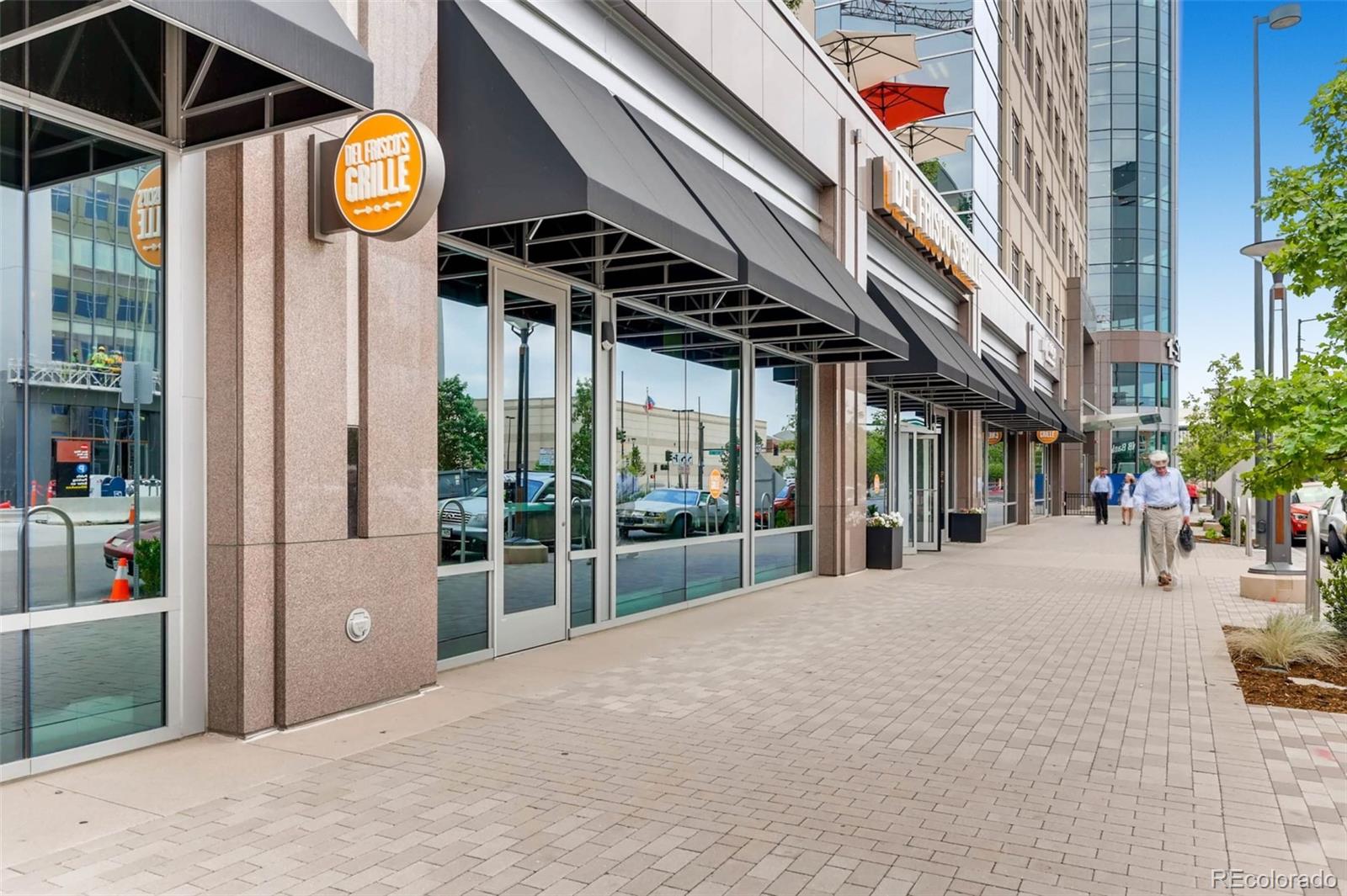 210 Cook Street Denver, CO 80206 - Photo 30 of 34 a view of an chairs and table in the patio