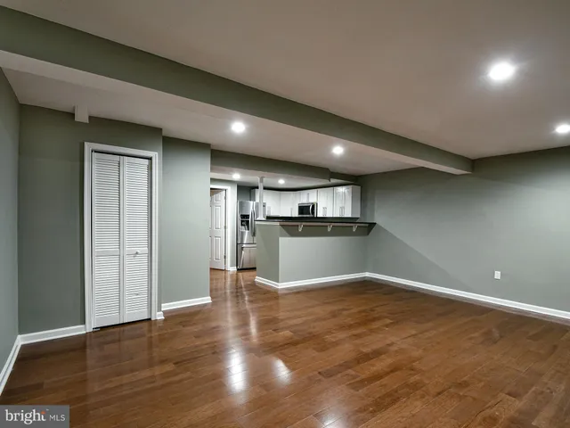a view of kitchen with wooden floor