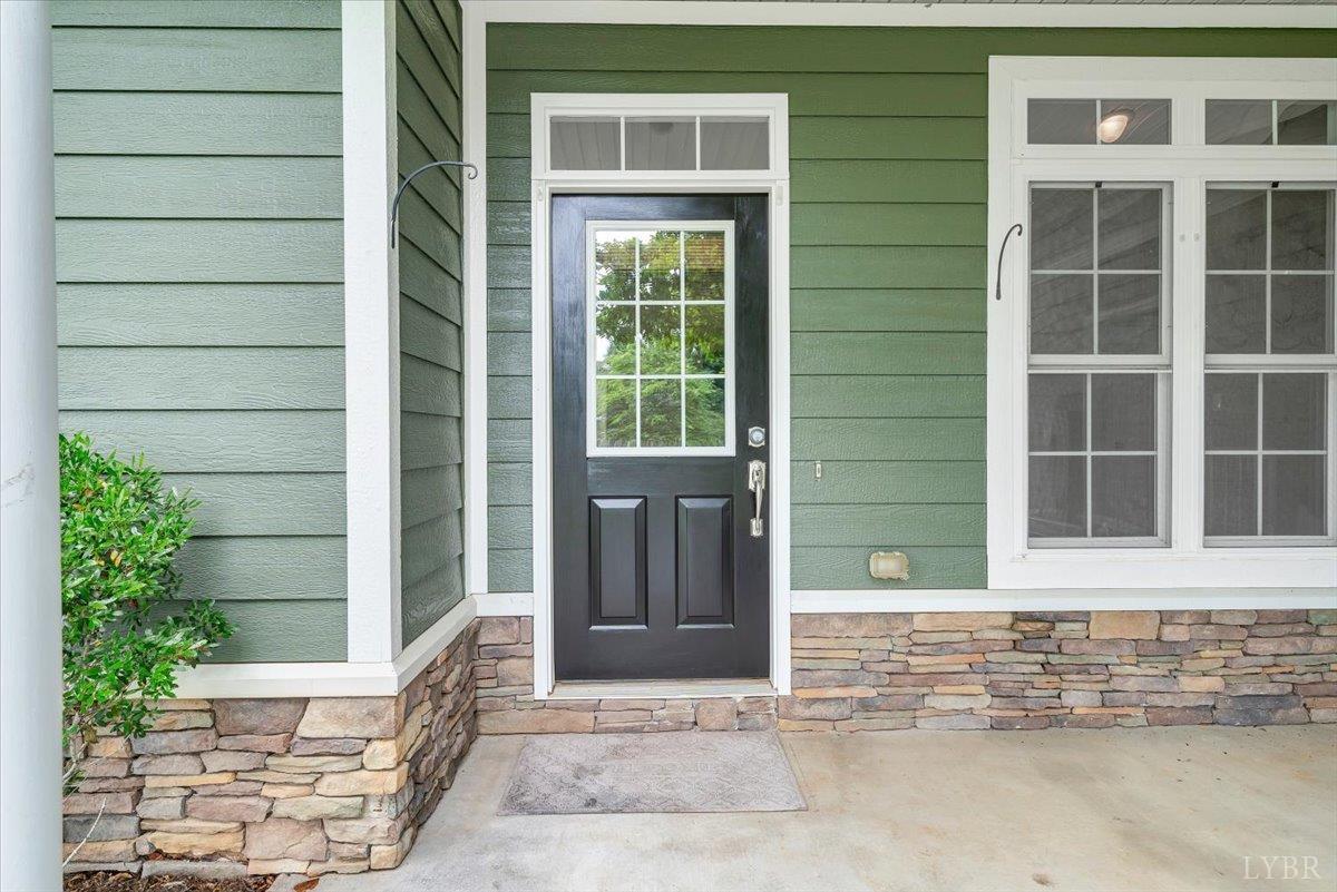 1250 Our Cove Road Huddleston, VA 24104 - Photo 5 of 70 a front view of a house with a window