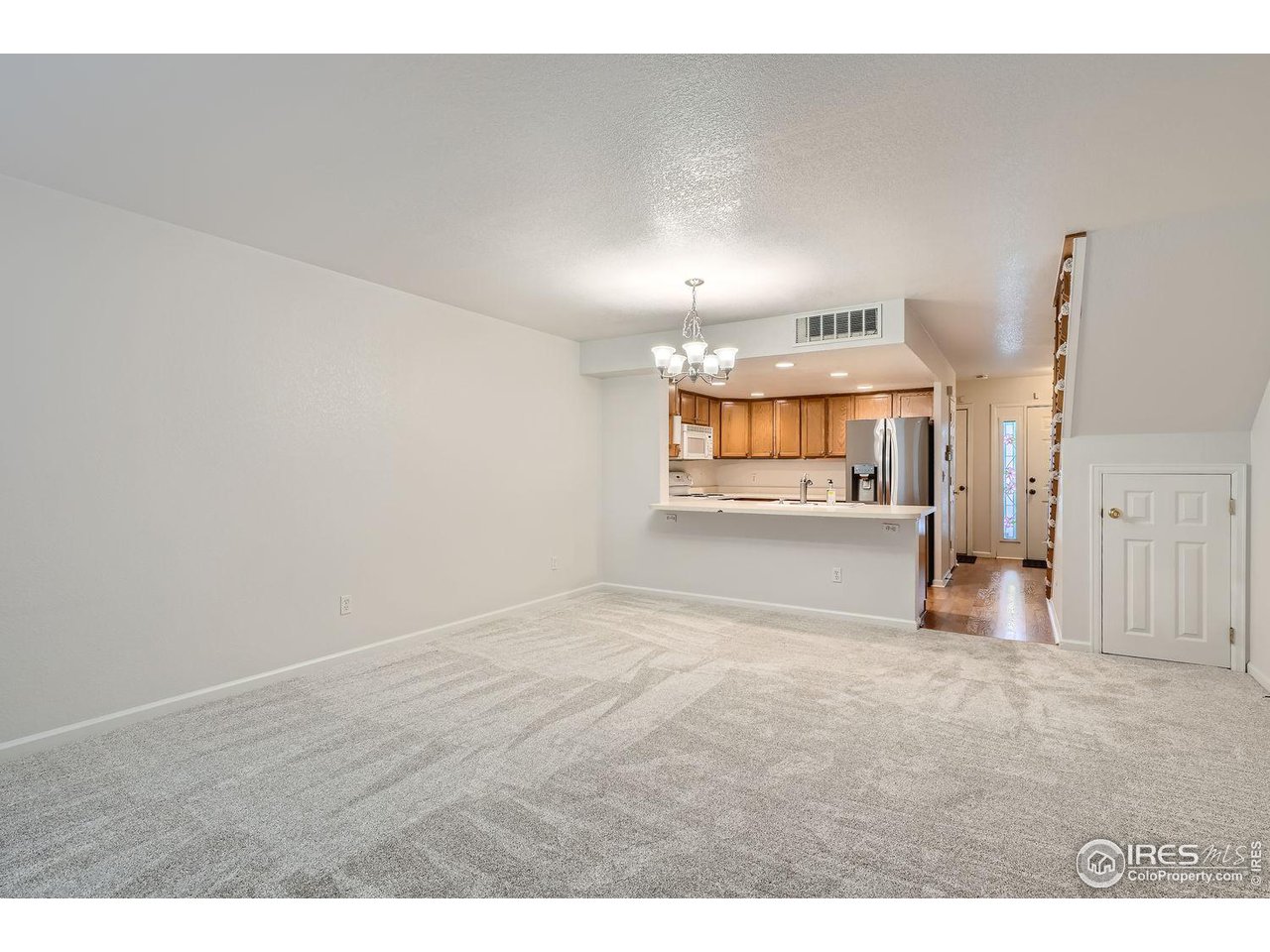 5091 Garrison Street, Unit 5 Wheat Ridge, CO 80033 - Photo 2 of 34 New carpet and paint throughout