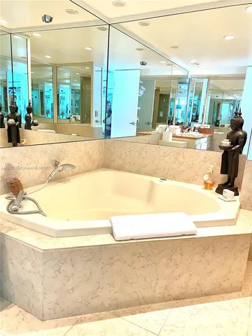 a view of a living room and bathroom