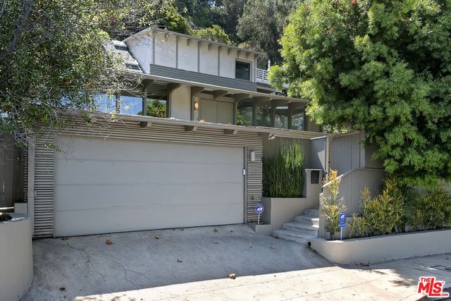 a house view with a outdoor space