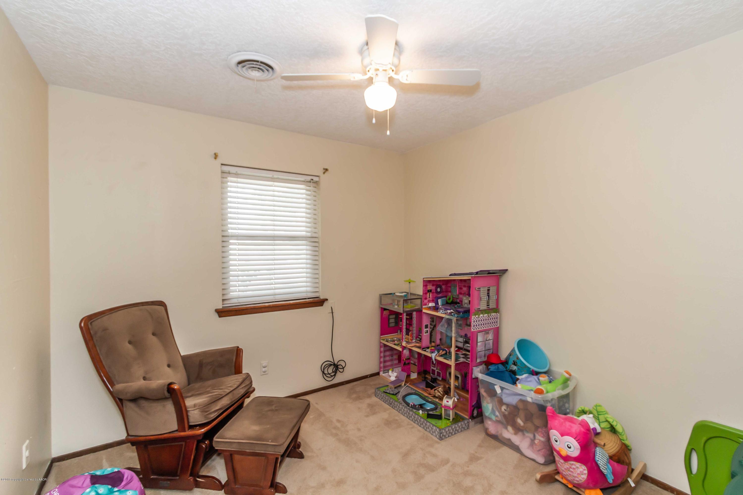 5205 South Milam Street Amarillo, TX 79110 - Photo 15 of 23 a view of a workspace with furniture