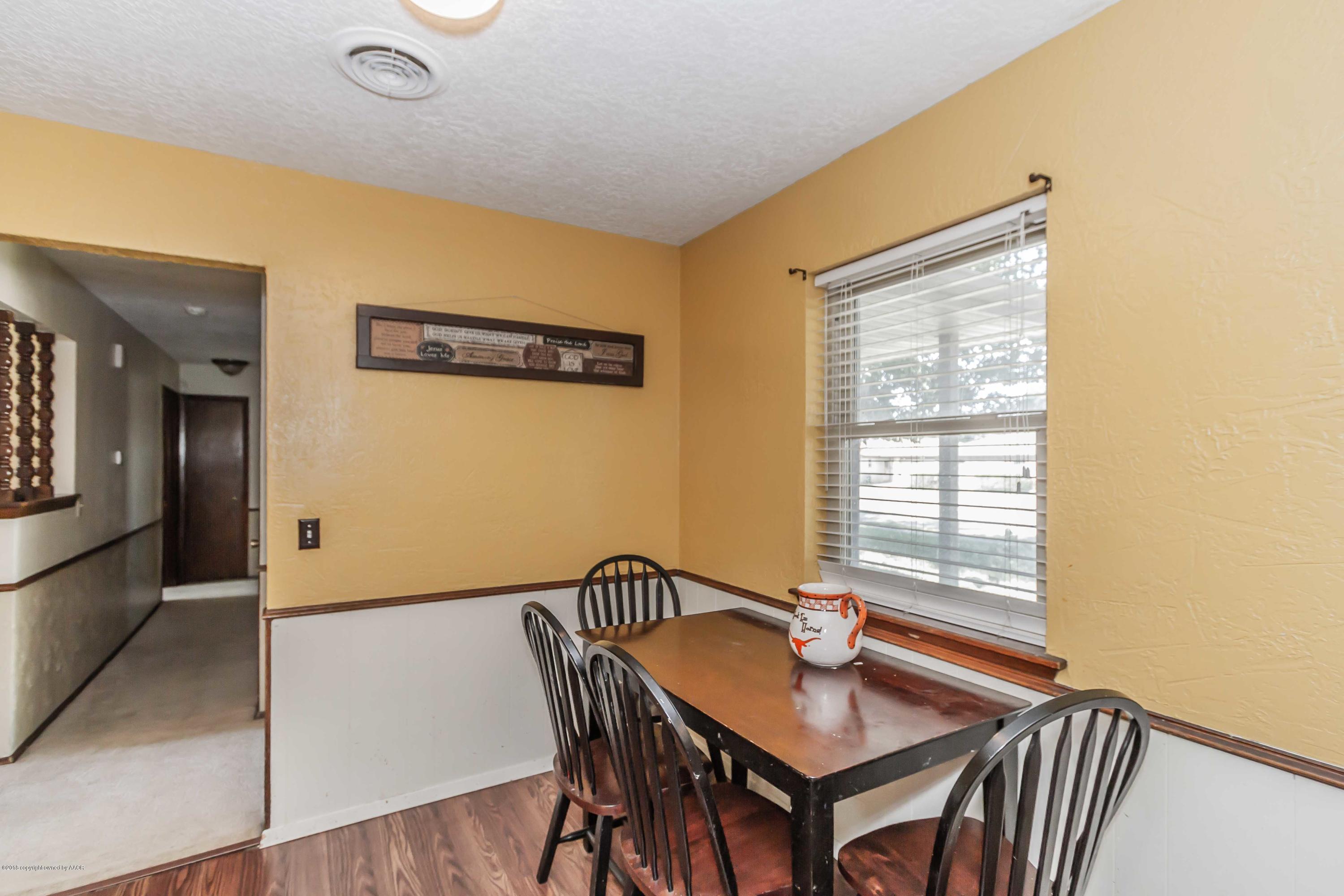 5205 South Milam Street Amarillo, TX 79110 - Photo 8 of 23 a view of a dining room with furniture and window