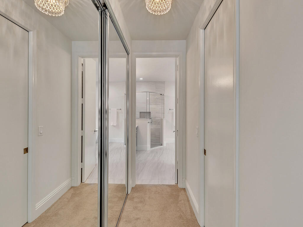3154 Northwest 61st Street Boca Raton, FL 33496 - Photo 29 of 83 Hallway to Primary Bathroom