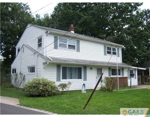 18 Weldon Road Edison, NJ 08817 - Photo 15 of 18 a front view of a house with a yard