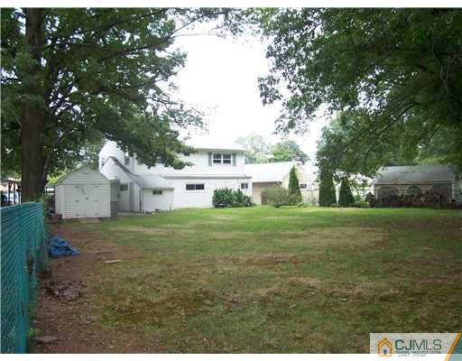 18 Weldon Road Edison, NJ 08817 - Photo 17 of 18 a view of a house with a yard