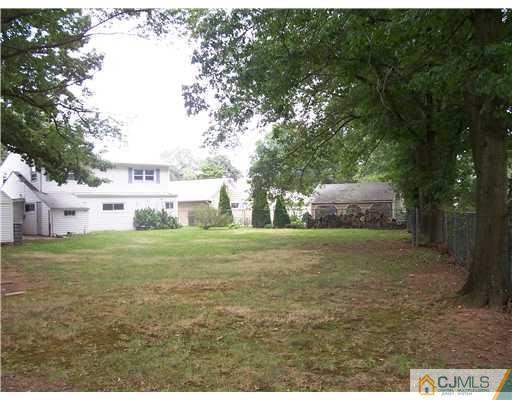 18 Weldon Road Edison, NJ 08817 - Photo 18 of 18 a view of a big yard with large trees