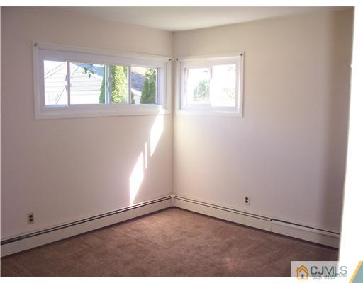 18 Weldon Road Edison, NJ 08817 - Photo 7 of 18 an empty room with windows