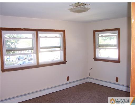 18 Weldon Road Edison, NJ 08817 - Photo 8 of 18 a view of an empty room with a window