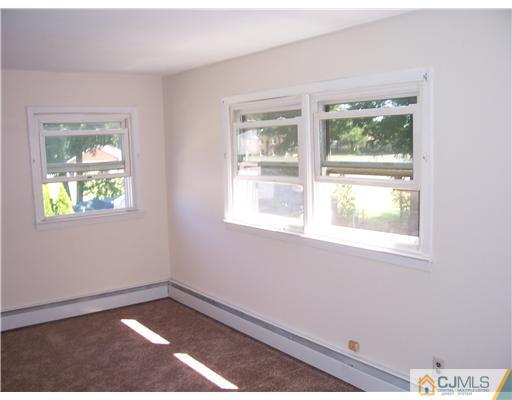 18 Weldon Road Edison, NJ 08817 - Photo 9 of 18 an empty room with a window