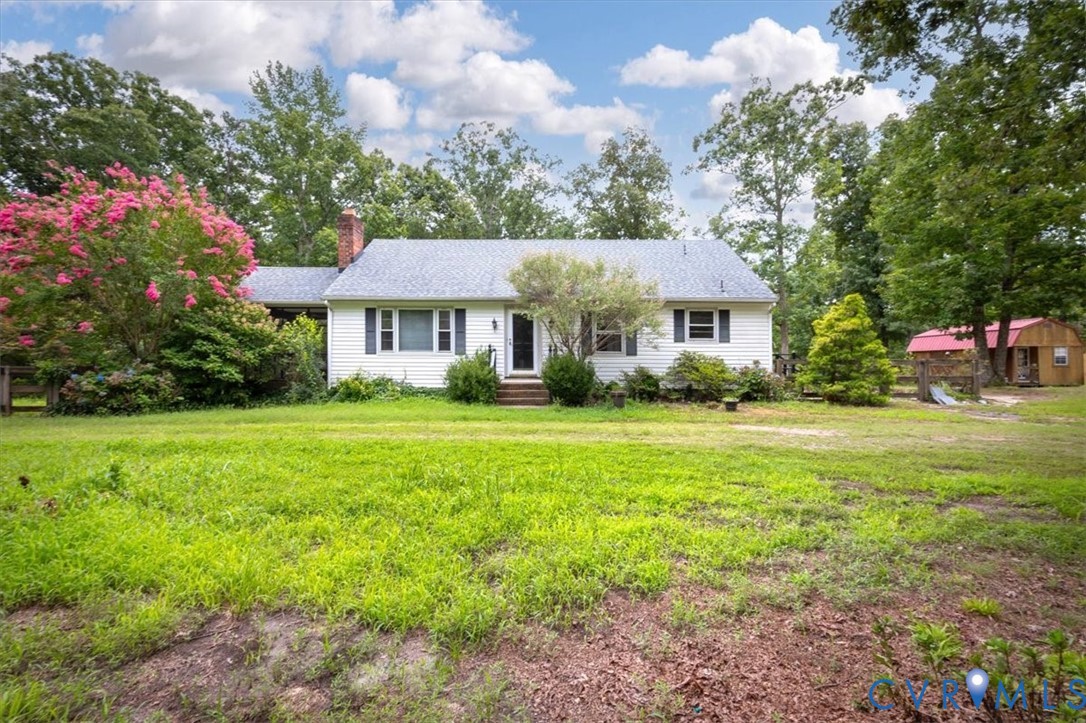 20101 River Road Chesterfield, VA 23838 - Photo 1 of 44 White siding residence with dark shutters and a gr