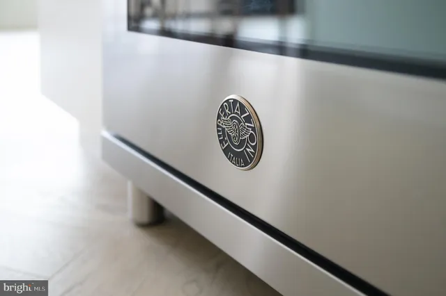 a view of a couches with wooden floor