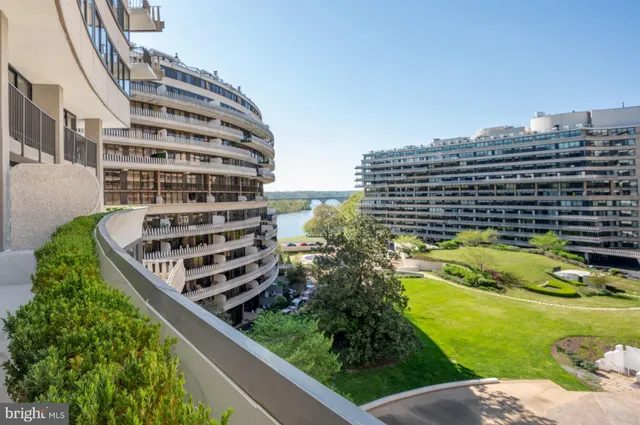 a view of a swimming pool with a balcony