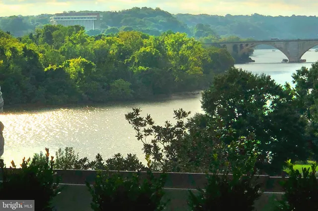 a view of a lake with a mountain in the background