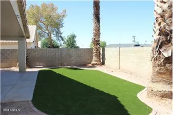 a view of yard with swimming pool
