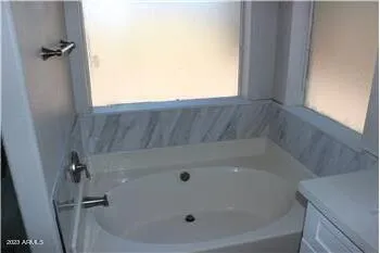 a bathroom with a tub