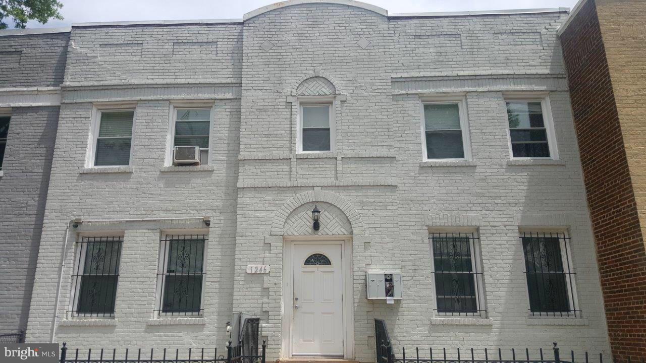 1246 Queen Street Northeast, Unit 3 Washington, DC 20002 - Photo 1 of 14 a front view of a house