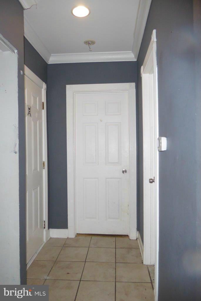 1246 Queen Street Northeast, Unit 3 Washington, DC 20002 - Photo 2 of 14 a view of a hallway to rooms