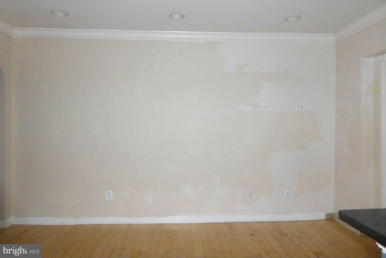 1246 Queen Street Northeast, Unit 3 Washington, DC 20002 - Photo 8 of 14 a view of wooden floor